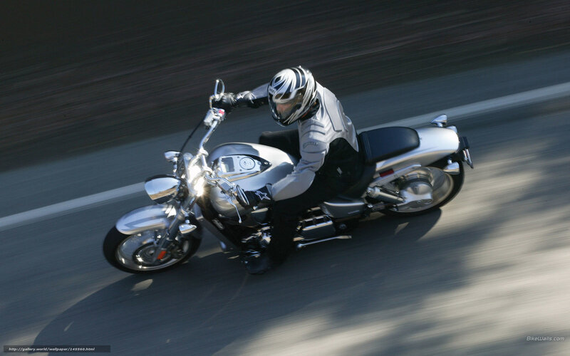 Motorcyclist on Silver Bike — Dynamic, Afternoon