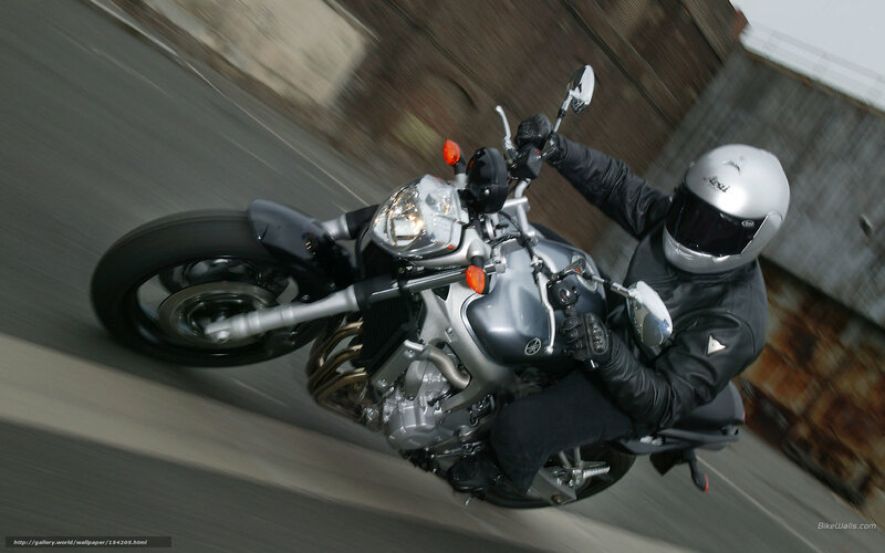 Motorcyclist on Silver Bike — Dynamic, Photograph