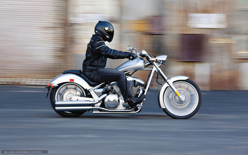 Motorcyclist on Silver Bike — Dynamic
