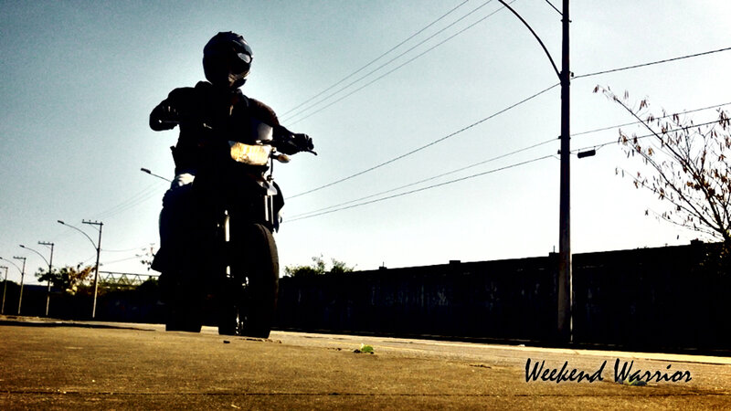 Motorcyclist on Street — Black, Dramatic, Afternoon