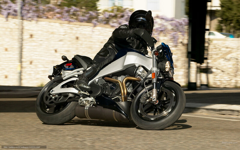 Motorcyclist on Street — Silver
