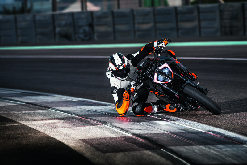 Motorcyclist on Track — Black, Dramatic, Photograph