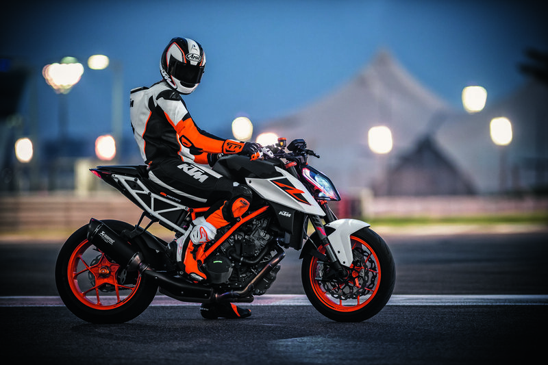 Motorcyclist on Track — Black, Dramatic