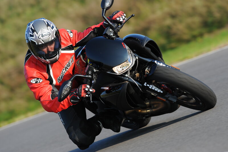 Motorcyclist on Track — Black, Dynamic, Afternoon, Photograph, Helmet, Road, Motorcycle