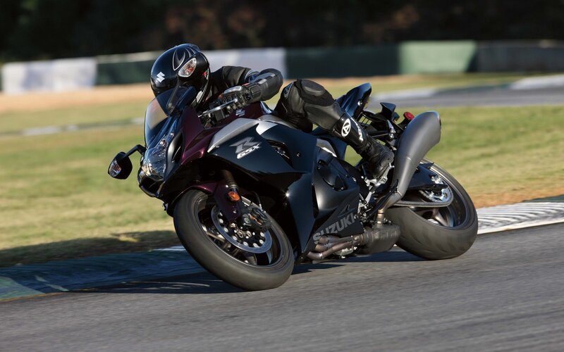 Motorcyclist on Track — Black, Dynamic, Afternoon, Photograph, Racing Suit, Helmet, Purple