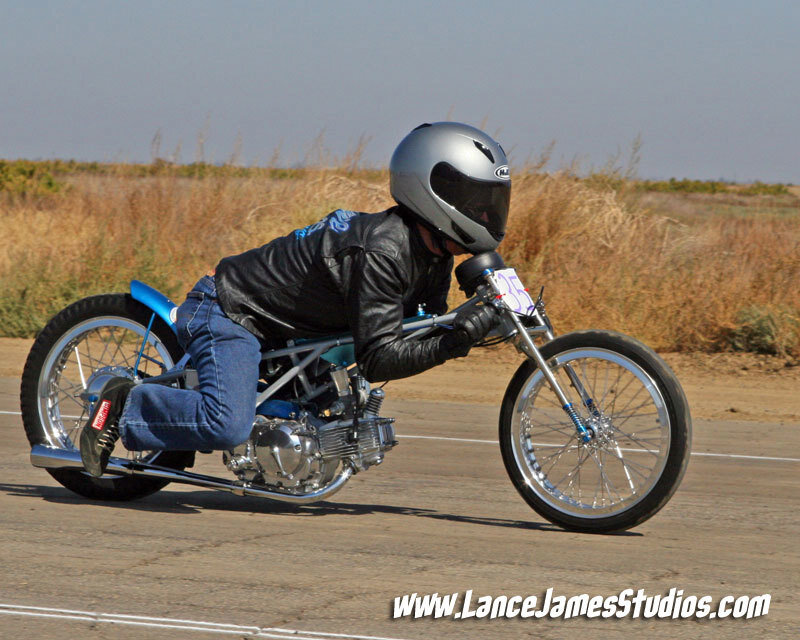 Motorcyclist on Track — Blue, Focused