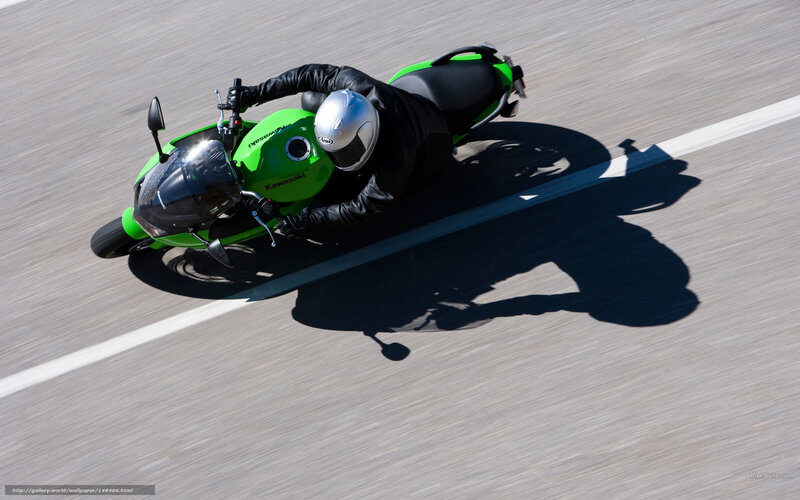 Motorcyclist on Track — Green, Dynamic, Afternoon, Photograph, Helmet