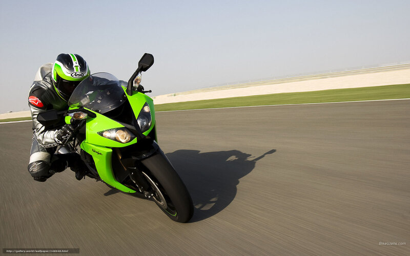 Motorcyclist on Track — Green, Dynamic, Afternoon