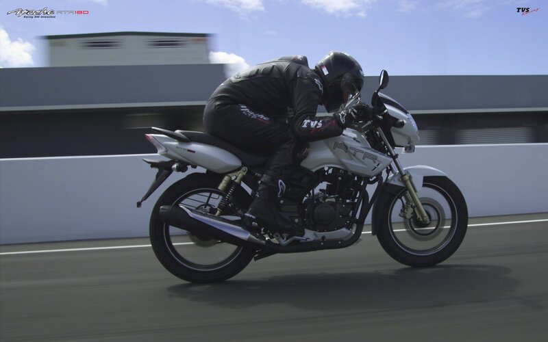 Motorcyclist on Track — White, Dynamic, Afternoon, Photograph, Rider, Motorcycle