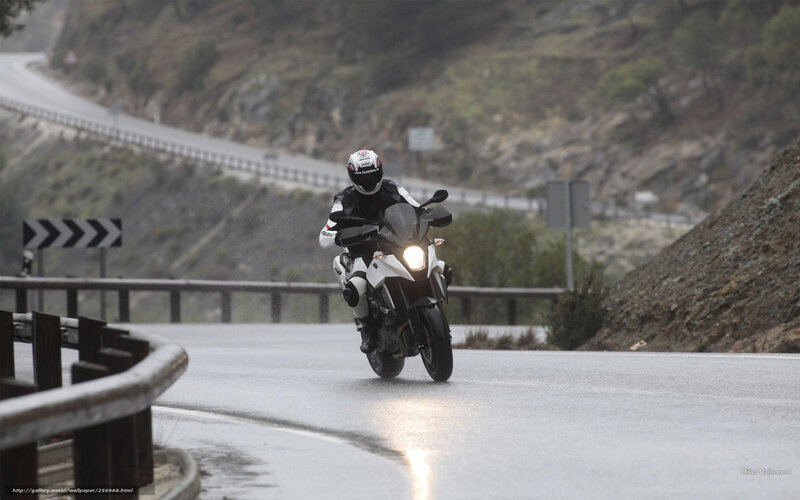 Motorcyclist on Wet Road — Gray, Dramatic