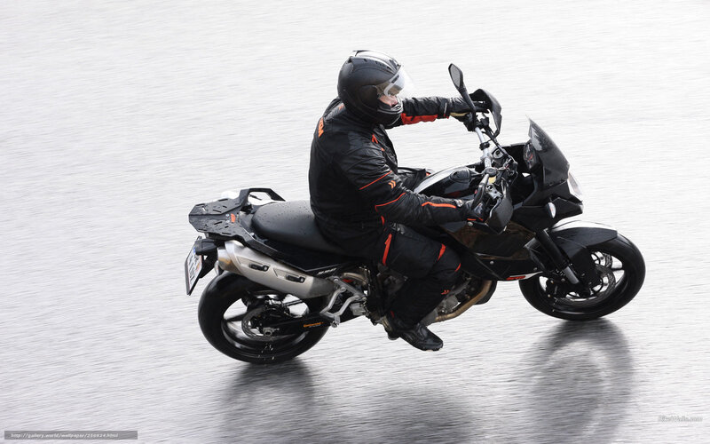 motorcyclist on wet road