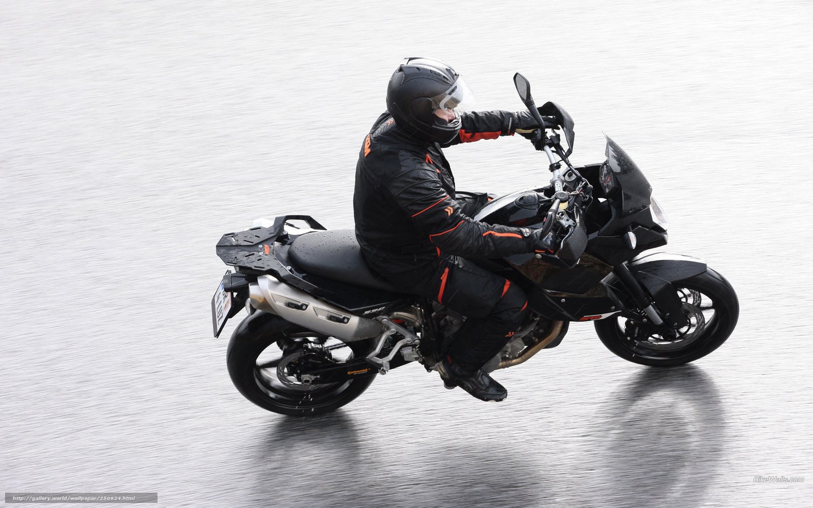 motorcyclist on wet road
