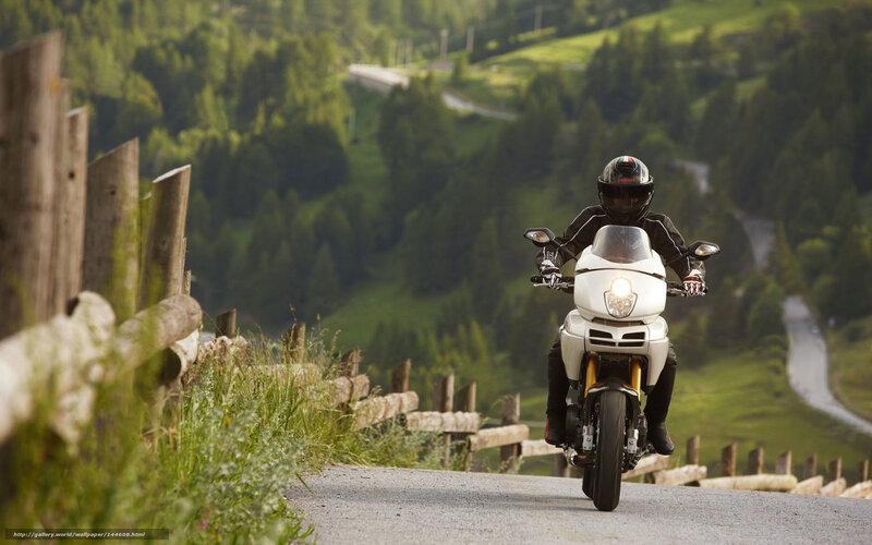Motorcyclist on White Bike — Green