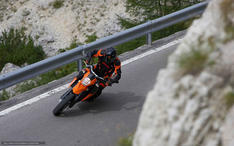 Motorcyclist on winding mountain road