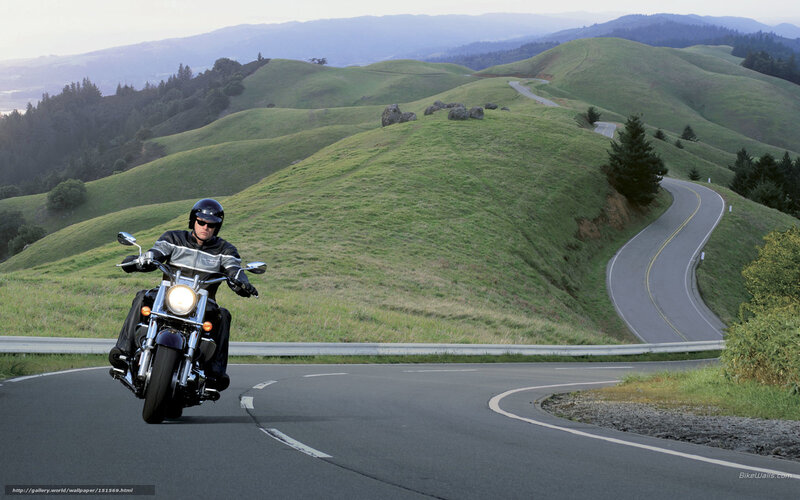 Motorcyclist on winding road