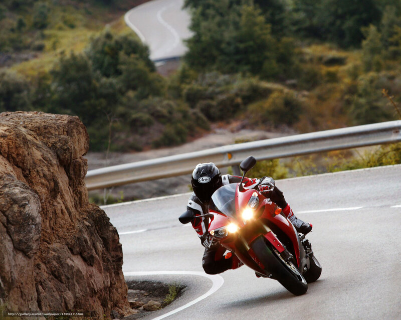 Motorcyclist on winding road
