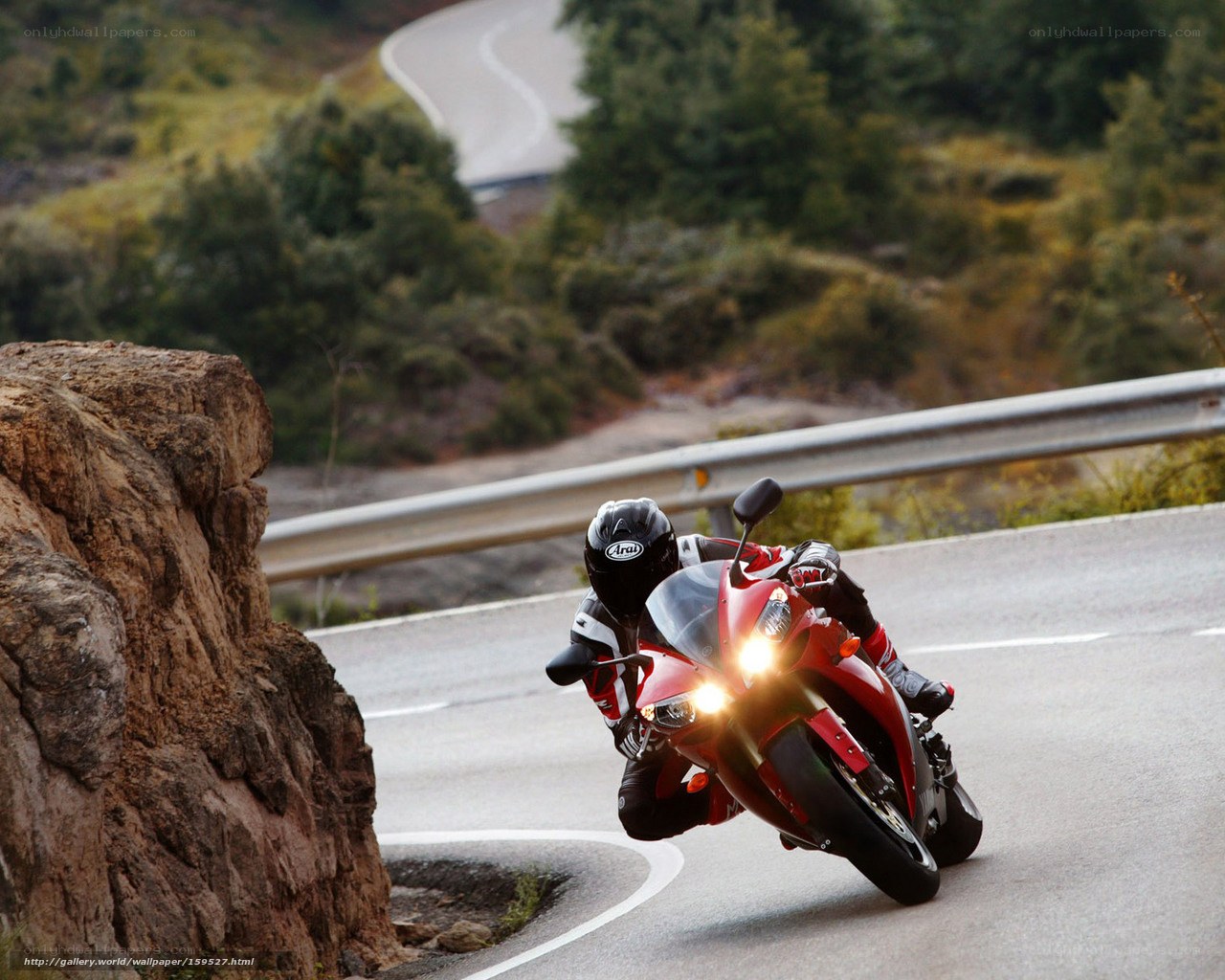 Motorcyclist on winding road