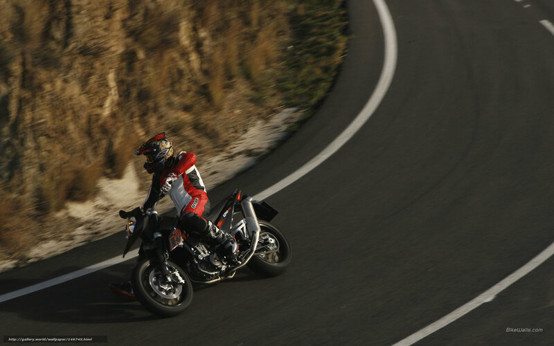 Motorcyclist on Winding Road — Black, Dynamic, Afternoon, Photograph, Helmet