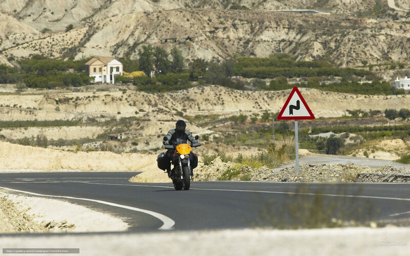 Motorcyclist on Winding Road — Black, Serene