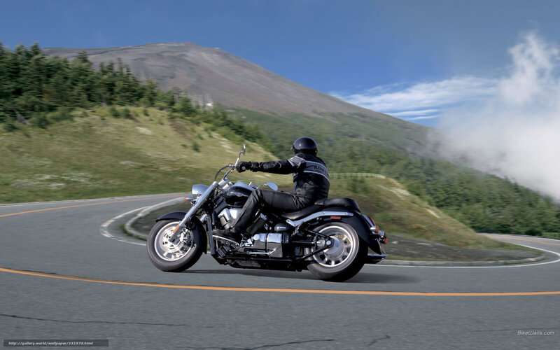 Motorcyclist on Winding Road — Blue