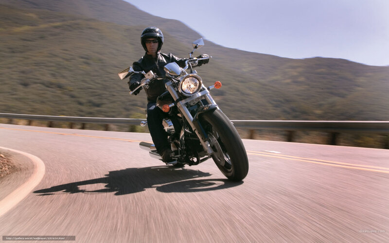 Motorcyclist on Winding Road — Brown, Dynamic, Afternoon