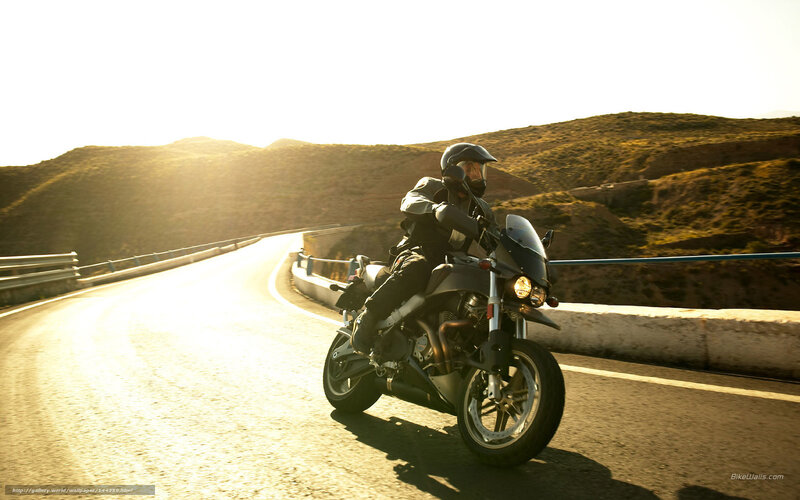 Motorcyclist on Winding Road — Gold