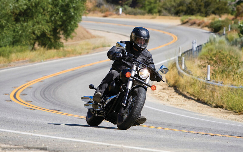 Motorcyclist on Winding Road — Gray, Active, Afternoon