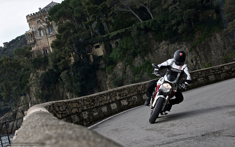 Motorcyclist on Winding Road — Gray, Dramatic, Photograph