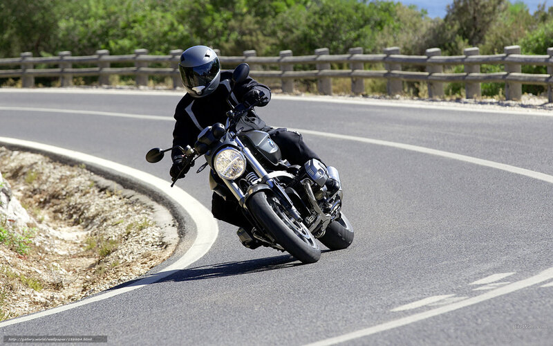 Motorcyclist on Winding Road — Gray, Dynamic, Afternoon, Photograph, Guardrail, Trees