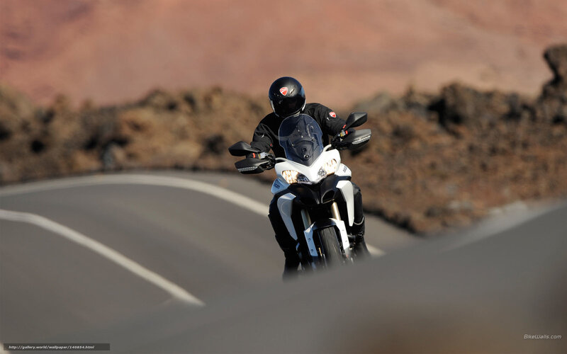 Motorcyclist on Winding Road — Gray, Dynamic, Afternoon