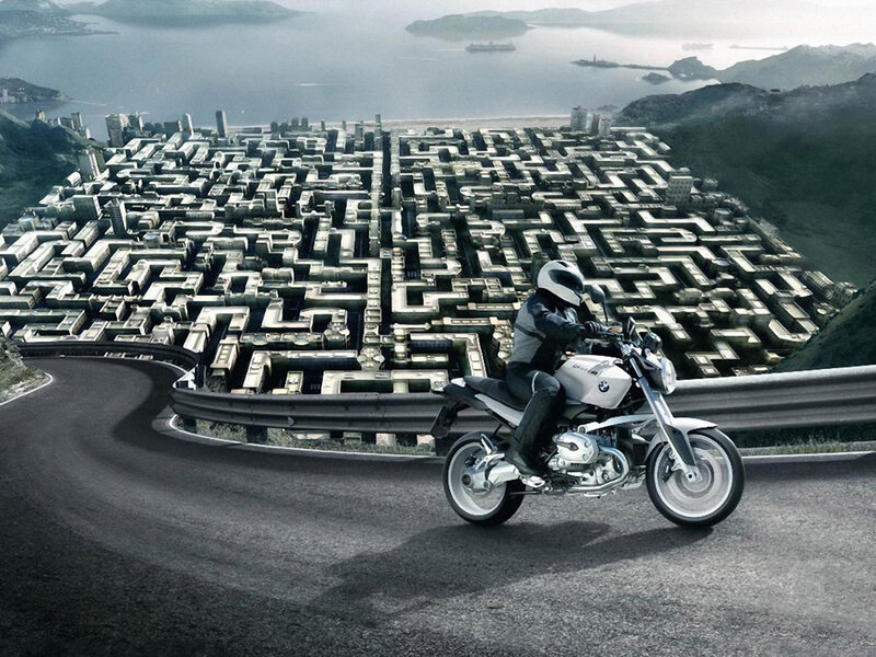 Motorcyclist on Winding Road — Gray