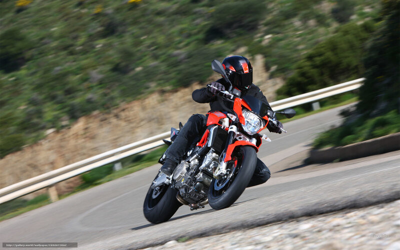 Motorcyclist on Winding Road — Red, Dynamic, Afternoon, Photograph, Guardrail