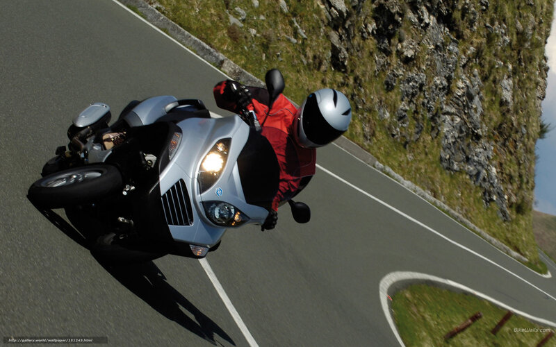 Motorcyclist on Winding Road — Silver
