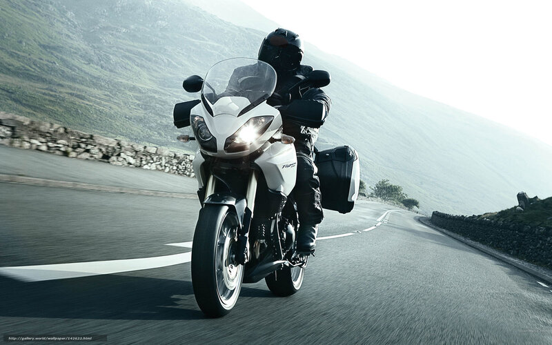 Motorcyclist on Winding Road — White, Dramatic