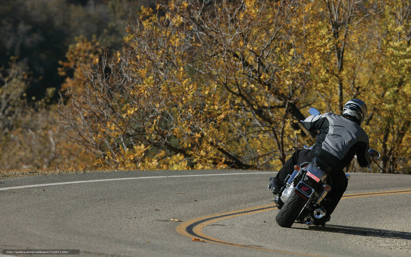 Motorcyclist on Winding Road — Yellow