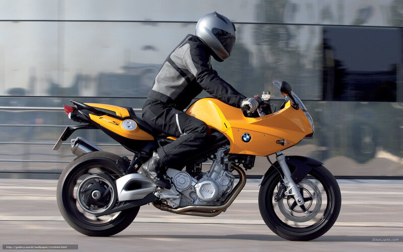 Motorcyclist on Yellow Bike — Dynamic, Afternoon, Photograph