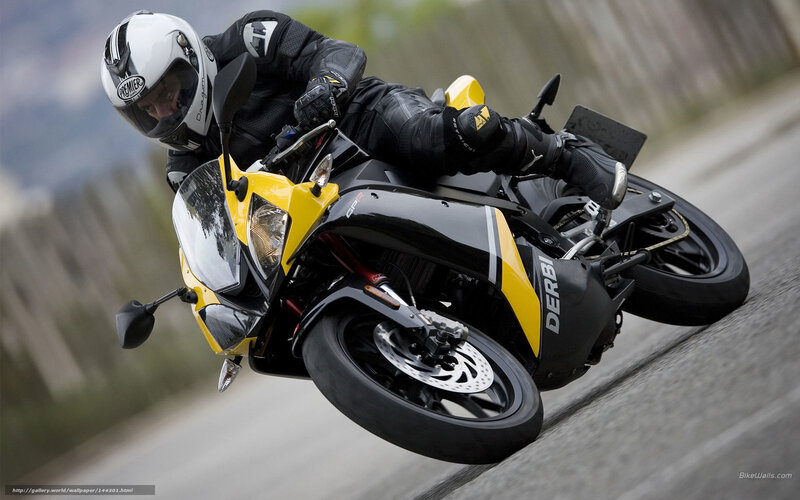 Motorcyclist on Yellow Bike — Dynamic, Photograph, Helmet