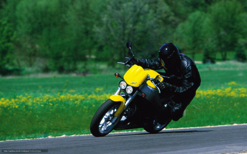 Motorcyclist on Yellow Bike — Dynamic, Spring