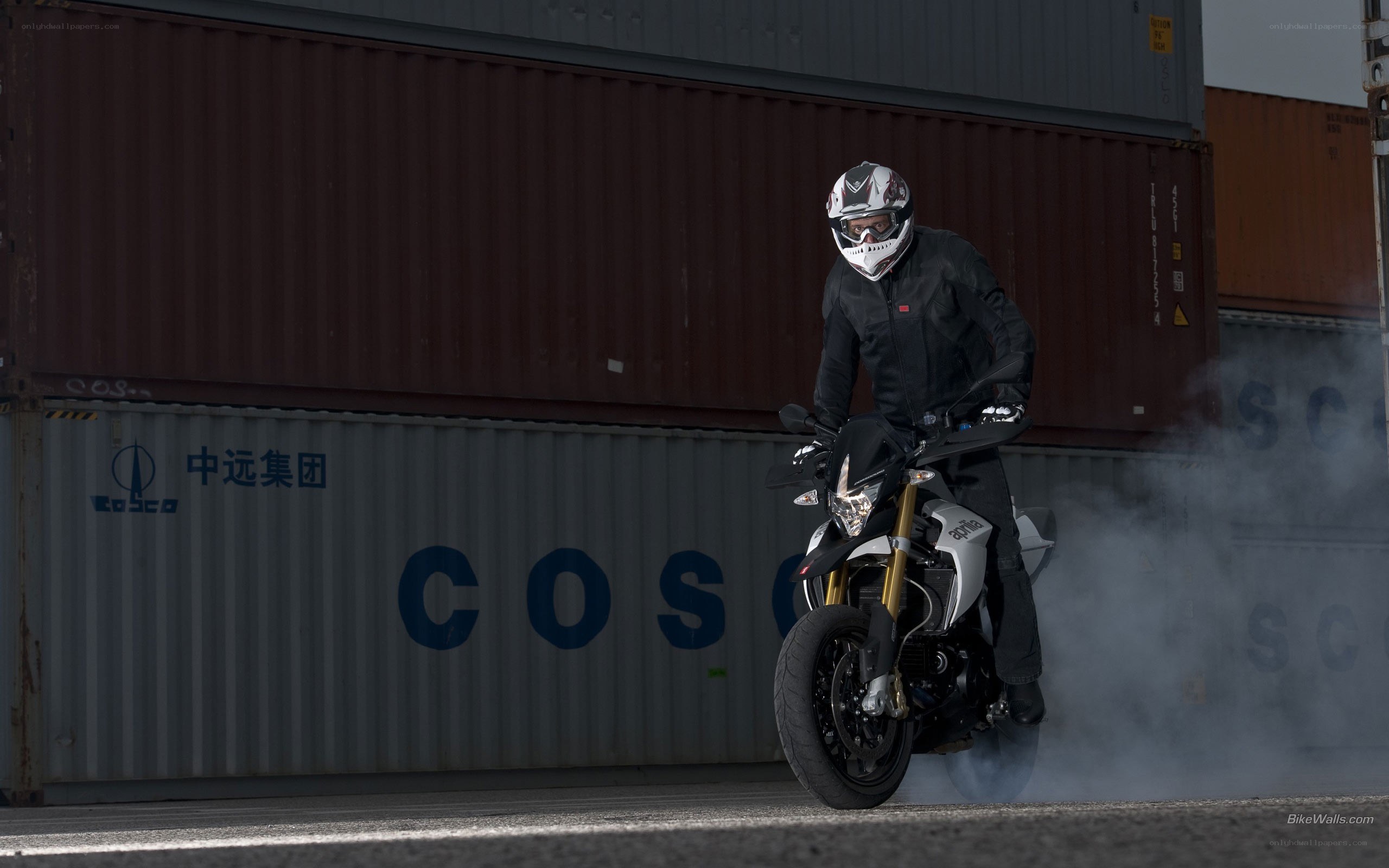 Motorcyclist performing burnout