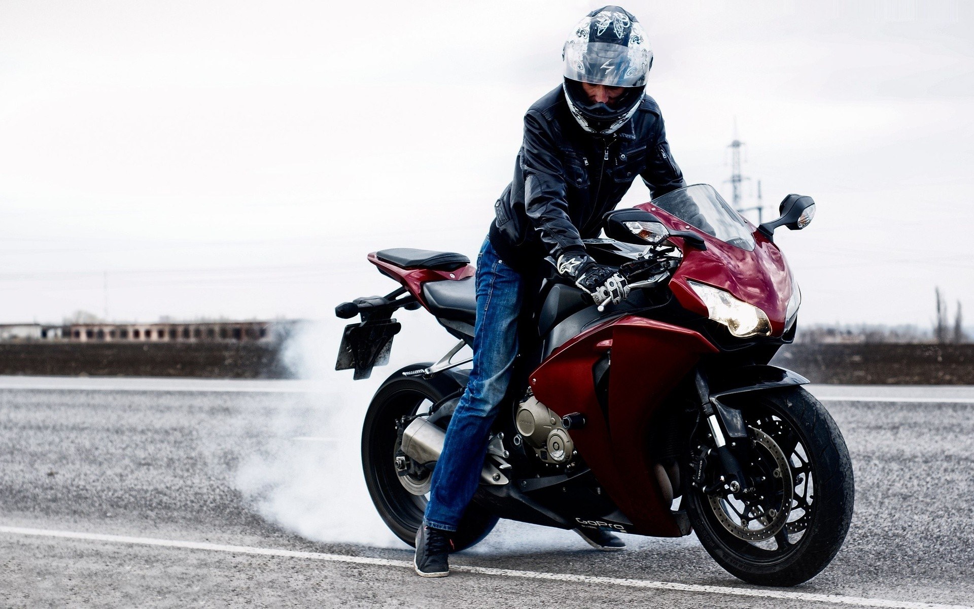 Motorcyclist performing burnout