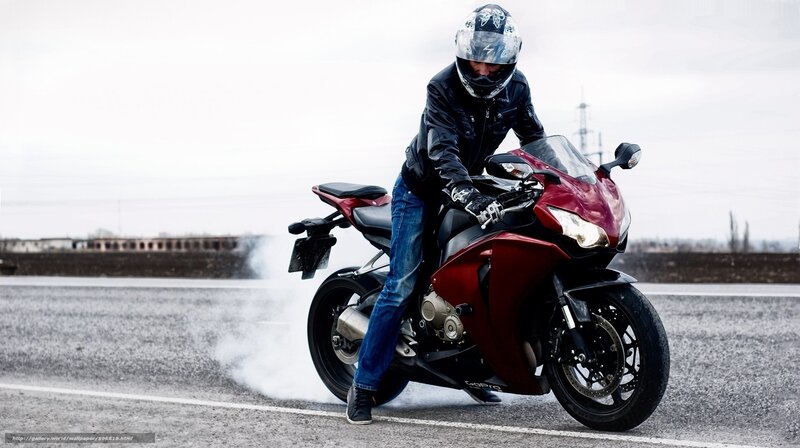 Motorcyclist performing burnout