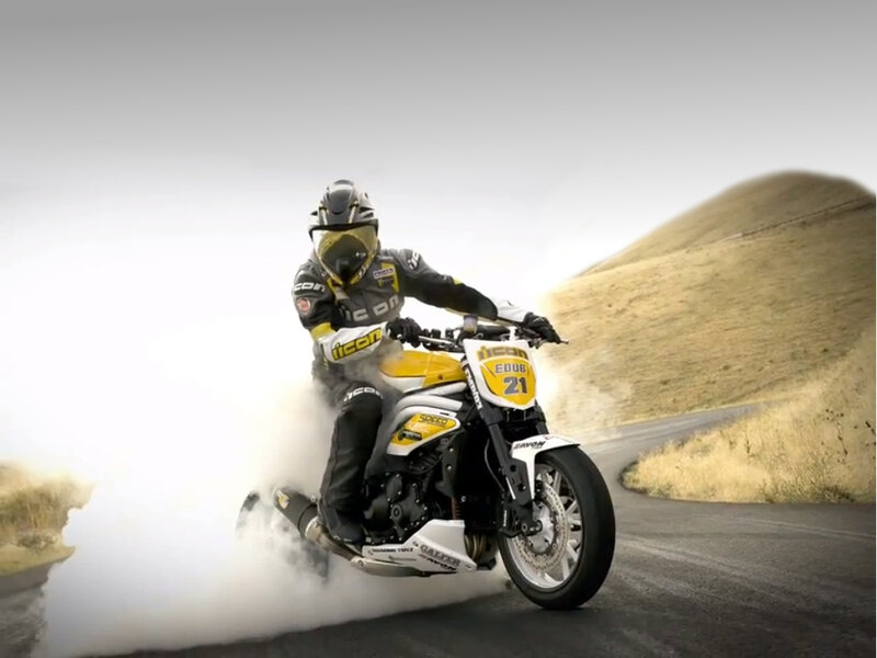 Motorcyclist Performing Burnout — White