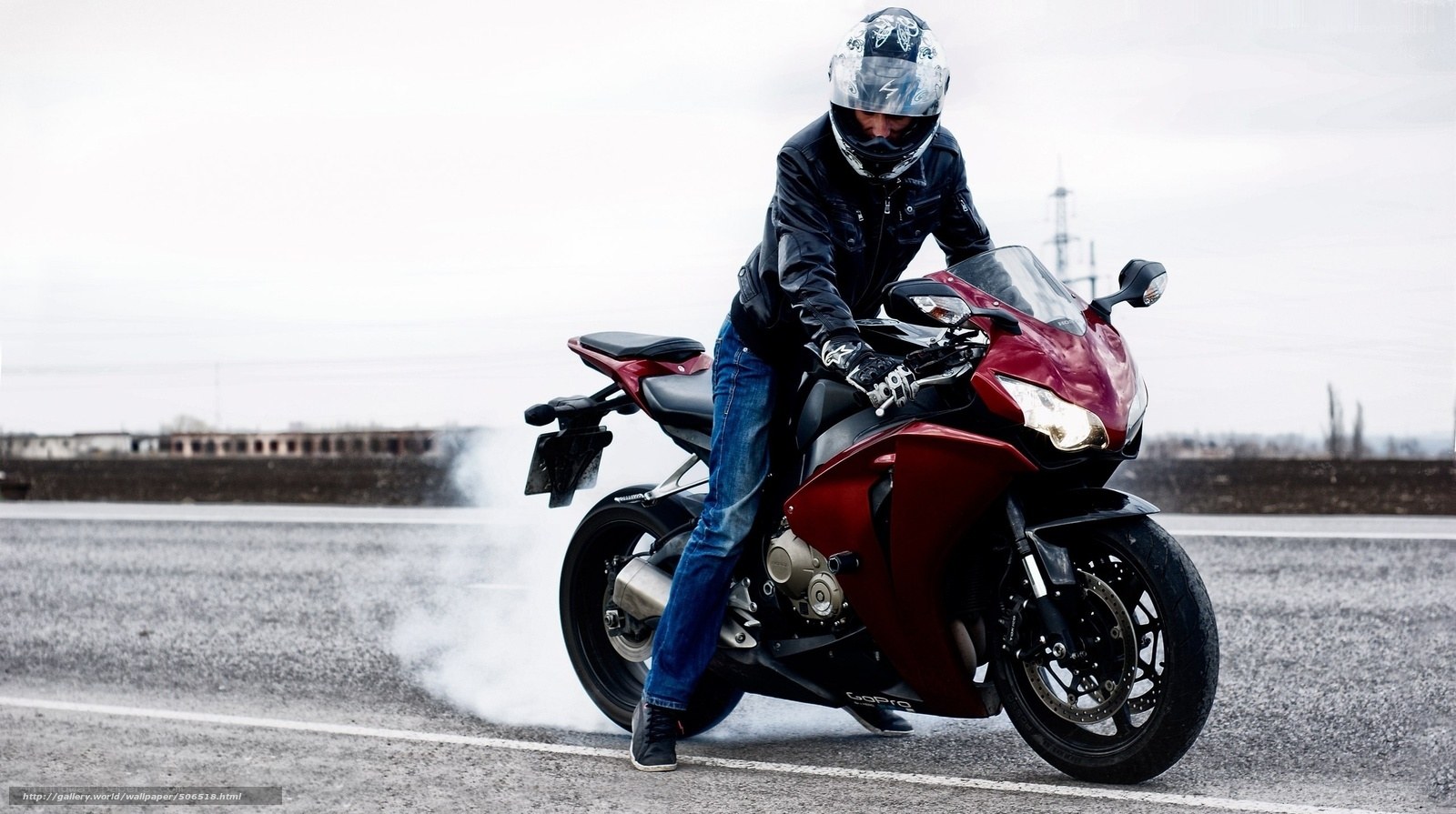 Motorcyclist performing burnout