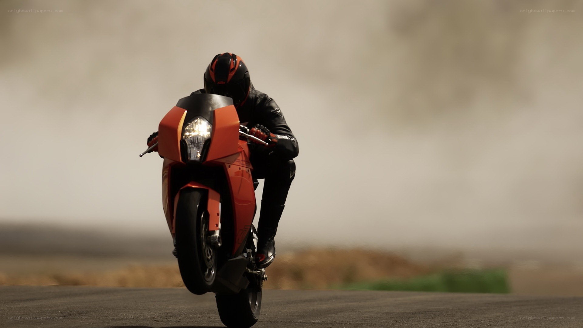 motorcyclist performing wheelie