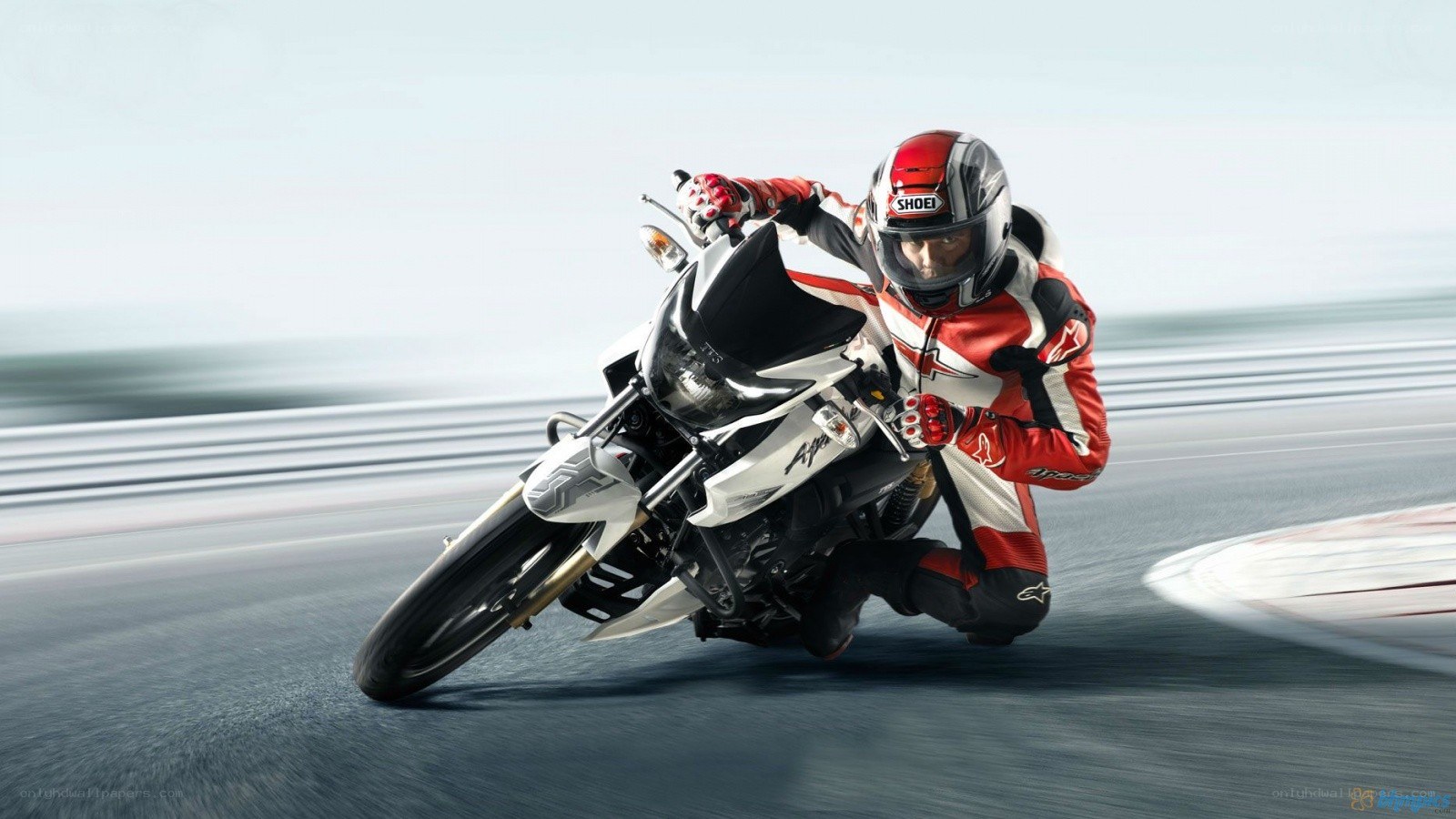 Motorcyclist racing on a track