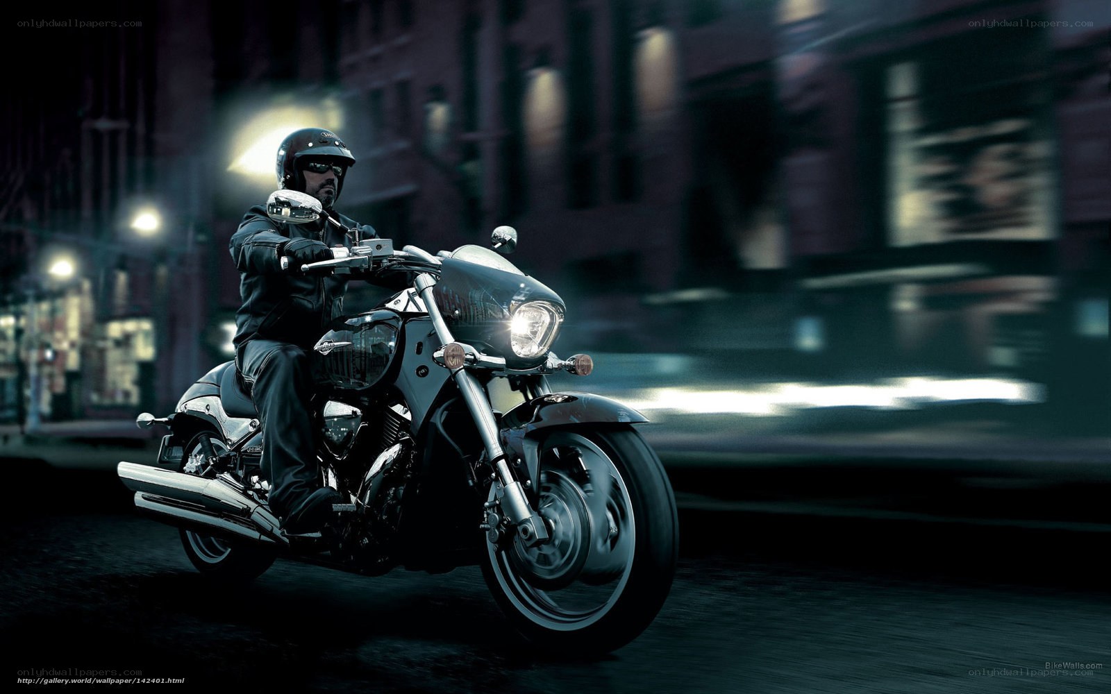 Motorcyclist riding at night