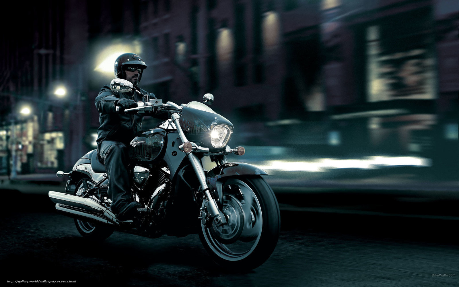 Motorcyclist riding at night