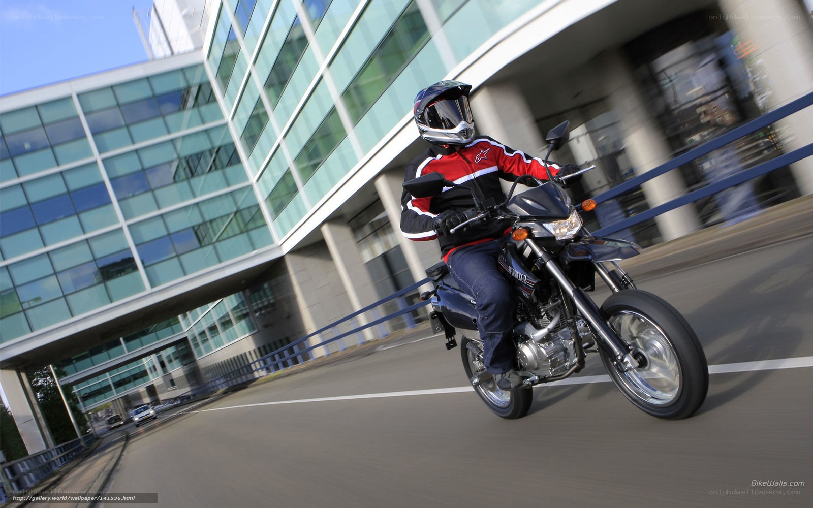 Motorcyclist riding in city
