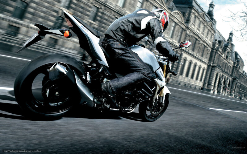 motorcyclist riding in city