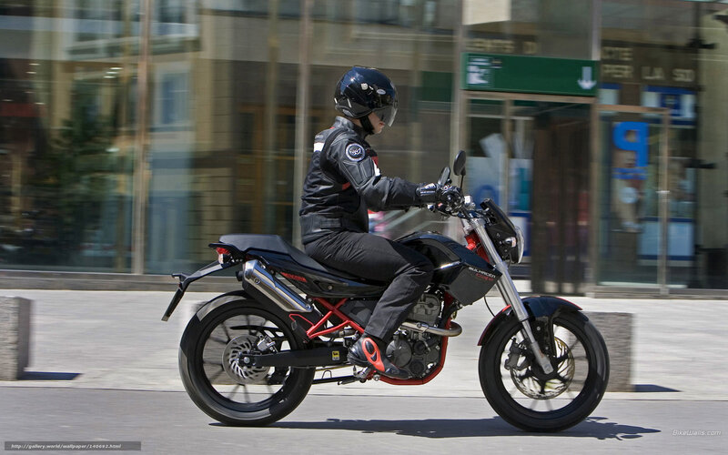 motorcyclist riding in city